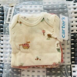 Carter’s Cream and Pink One Piece Bodysuit